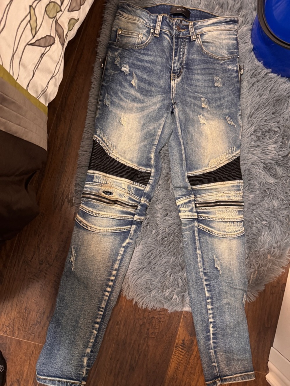 AMIRI Distressed Light Blue Skinny Jeans with Black Knee Panels